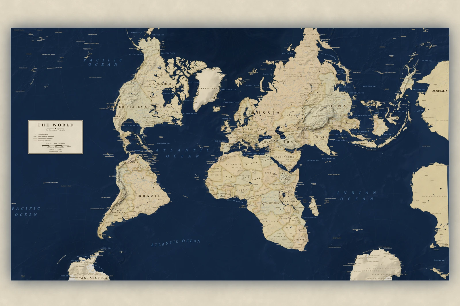 Lee tetrahedral projection world map, angles and local shapes preserved, Regency style (Navy sea, ochre and parchment), with all place names in English